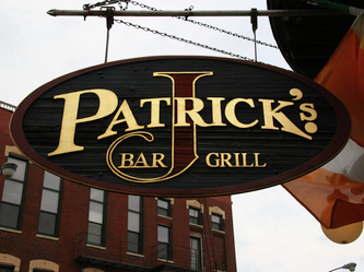 Image of sandblasted blade sign for J Patrick's in Chicago,IL