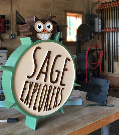 Sage Explorers Sign Lake Forest Wooden Sign Company #timjanda1 #woodensignco Blade Sign 
