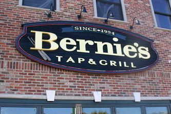 Image of Bernie's Tap Wooden Facade sign on Clark St. Wrigleyville Chicago,IL Chicago Sign Companies, Wooden Signs Chicago