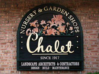 Image of Chalet Nursery sign in Glenview Illinois, Wood Signs Deerfield, Signs Elkhorn, WI