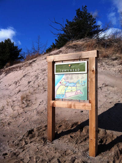 Wayfinding signage, wayfinding signs, wooden park signs, cedar park sign, Lake Geneva Wisconsin, Elkhorn, Wayfinding systems Chicago, Custom trail maps, park and rec signs