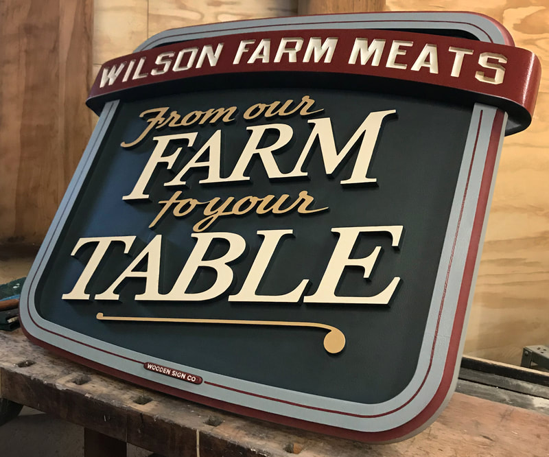 CNC Carved Sign, Signs Elkhorn WI, Interior Signs, HDU Signs Wisconsin, Wilson Farm Meats Sign, Butcher Shop Sign, Hand Carved Ribbon, Hand Carved Sign, Wood Signs Chicago, Wood Signs Lake Geneva